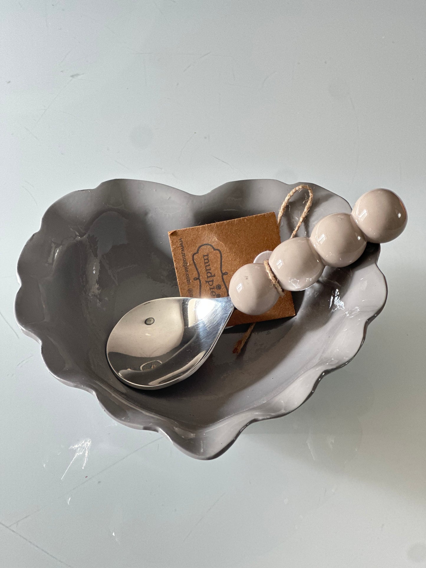 Gray Heart enamel candy dish with taupe spoon