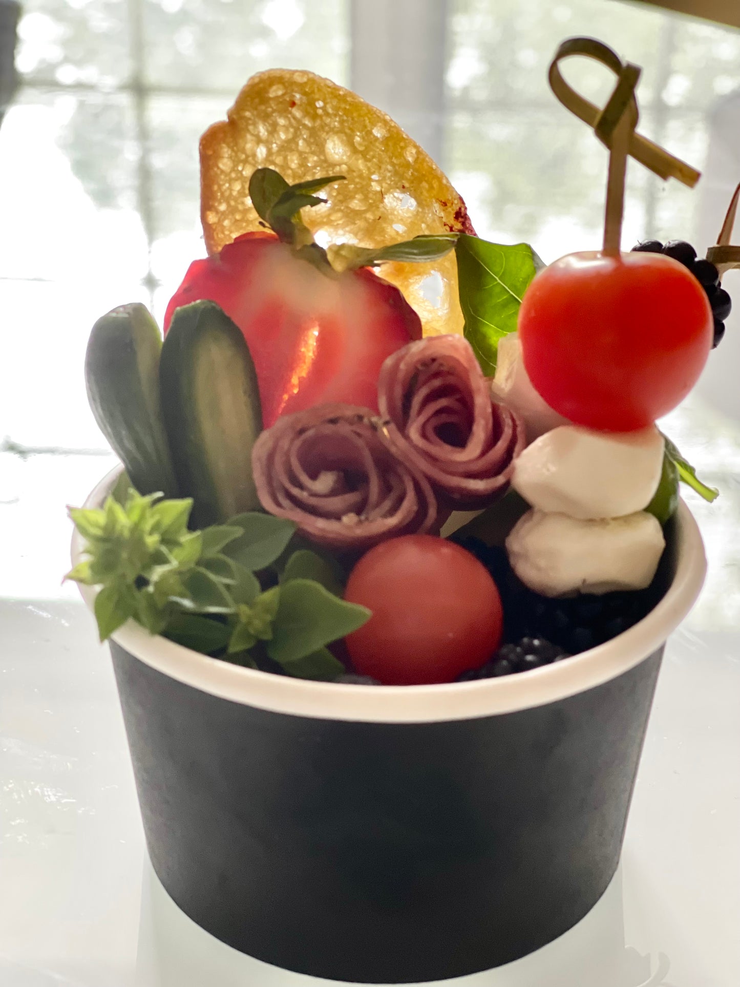 Turn Charcuterie into the ultimate finger food with these portable cups. These are the perfect single serving cups for any event. The perfect Golf snack that you can grab and go. Filled with all your favorites. Charcuterie Cups Serving 1 Cheeses and Meats Fruits and/or Veggies Toasted Ciabatta and/or Cracker