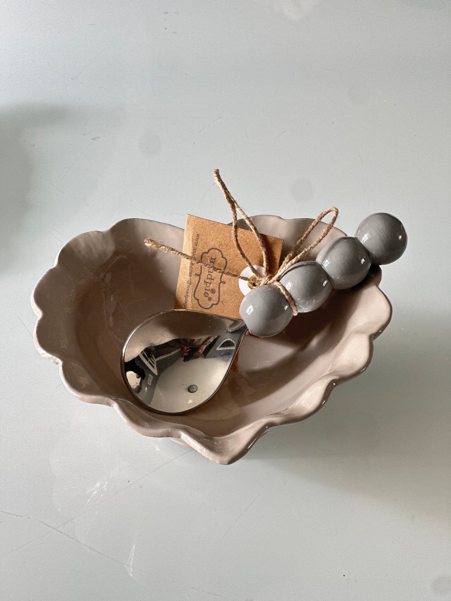 Taupe Heart enamel candy dish with gray spoon