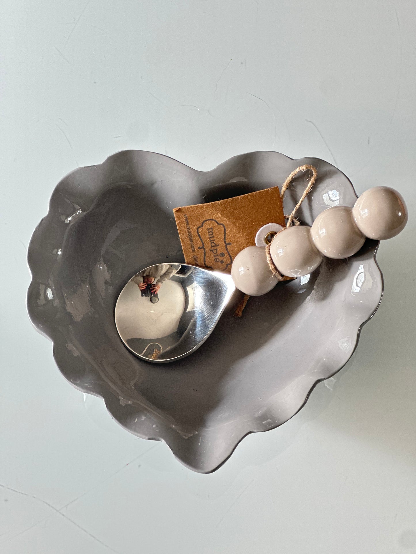 Gray Heart enamel candy dish with taupe spoon